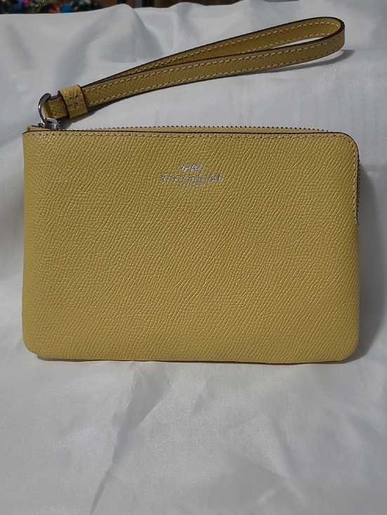 Coach Handbags - Coach Yellow Leather Corner Zip Wristlet with Strap